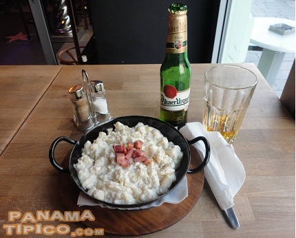 [Halusky is a traditional slovakian dish. It is a potato-based pasta mixed with goat cheese served with diced bacon.]