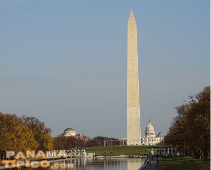[The Washington Monument, another icon of the city, is located in the center of the National Mall.]